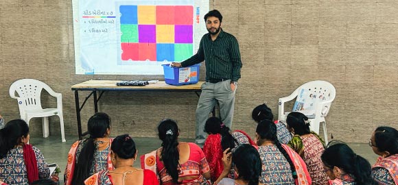 Anganwadi worker being trained on educational methods