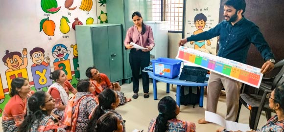 Teacher conducting training session with visual aids