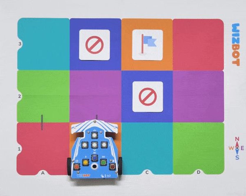 Primary school children actively engaged with educational toys and robots in classroom setting