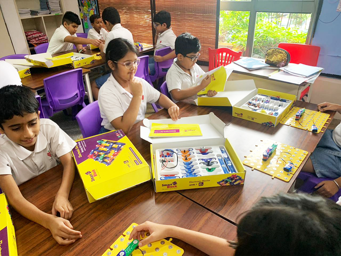 Students collaborating on a hands-on AI robotics project