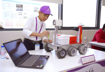 Student working on creative robotics project