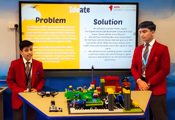 Students presenting problem-solving project