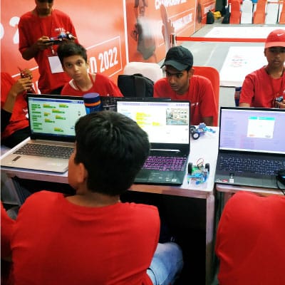 Students at coding bootcamp learning programming skills